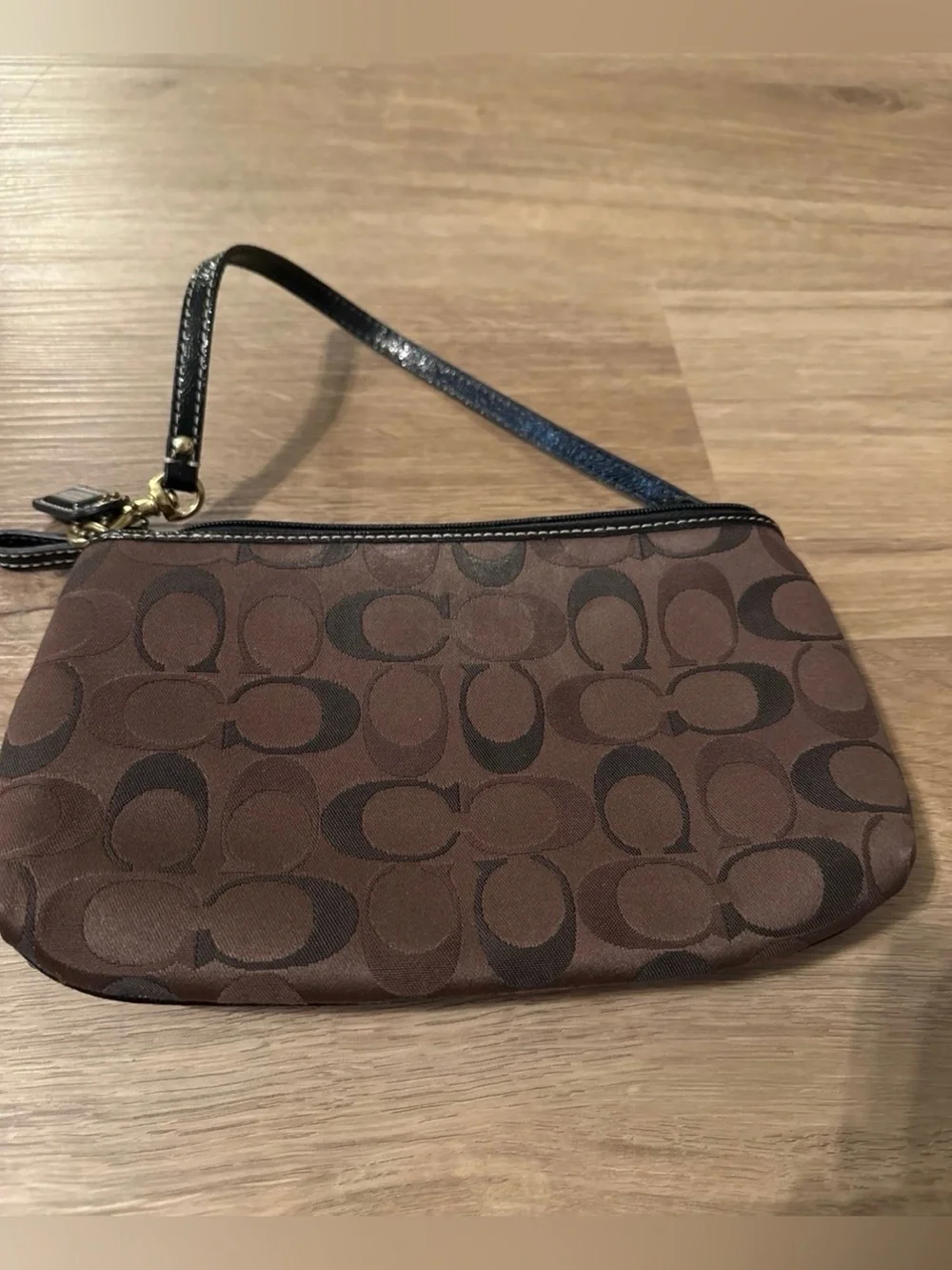 Coach Dark Brown Stripe Round Wristlet